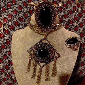 Set of four ring, necklace and ring